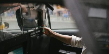 Photo by Tim  Samuel: https://www.pexels.com/photo/crop-male-passenger-inserting-card-in-credit-card-reader-in-taxi-5835268/