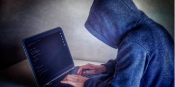 Image source: https://www.pexels.com/photo/anonymous-hacker-with-on-laptop-in-white-room-5829726/
