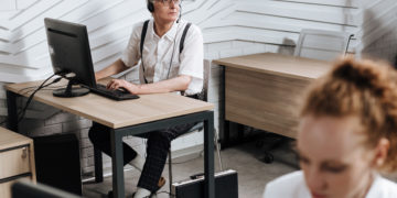 Photo by Ron Lach  from Pexels: https://www.pexels.com/photo/shallow-focus-of-a-man-working-in-the-office-8691821/
