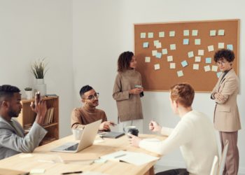 Photo by fauxels: https://www.pexels.com/photo/women-standing-beside-corkboard-3184296/