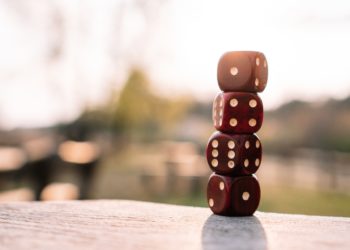 Photo by Matthias Groeneveld: https://www.pexels.com/photo/red-dice-stacked-on-table-on-terrace-4200740/