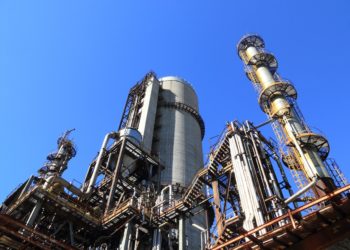 Photo by Pixabay: https://www.pexels.com/photo/low-angle-shot-of-manufacturing-plant-under-blue-sky-257700/