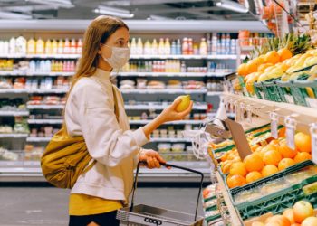 Photo by Anna Shvets from Pexels: https://www.pexels.com/photo/woman-in-yellow-tshirt-and-beige-jacket-holding-a-fruit-stand-3962285/