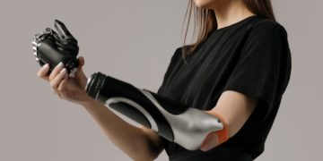 Photo by cottonbro: https://www.pexels.com/photo/woman-in-black-t-shirt-holding-black-and-white-leather-gloves-6153115/