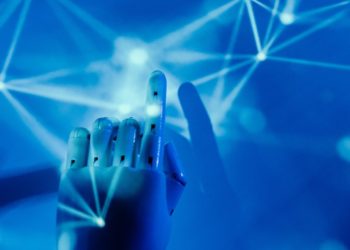 Photo by Tara Winstead: https://www.pexels.com/photo/robot-s-hand-on-a-blue-background-8386437/
