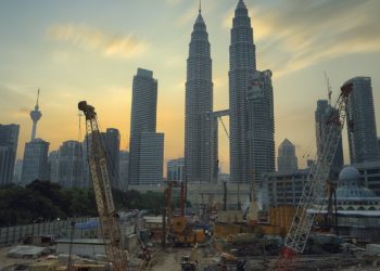 Photo by Zukiman Mohamad: https://www.pexels.com/photo/yellow-tower-crane-190417/