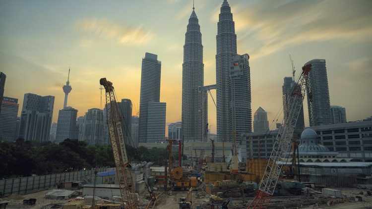 Photo by Zukiman Mohamad: https://www.pexels.com/photo/yellow-tower-crane-190417/