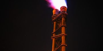 Photo by Pixabay: https://www.pexels.com/photo/low-angle-view-of-illuminated-tower-against-sky-at-night-327041/