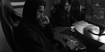 Photo by Tima Miroshnichenko: https://www.pexels.com/photo/grayscale-photo-of-people-sitting-on-chairs-while-using-computers-5380598/
