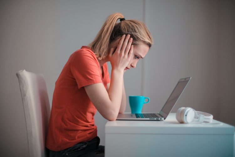 Photo by Andrea Piacquadio: https://www.pexels.com/photo/young-troubled-woman-using-laptop-at-home-3755755/