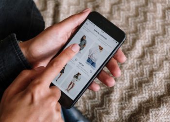 Photo by cottonbro studio: https://www.pexels.com/photo/person-holding-black-iphone-5-5076511/