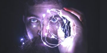 Photo by David Cassolato: https://www.pexels.com/photo/person-holding-string-lights-photo-818563/