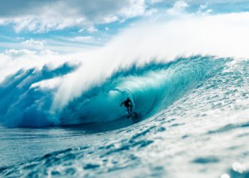 Photo by Kammeran Gonzalez-Keola: https://www.pexels.com/photo/man-riding-surfboard-in-wavy-ocean-7925859/