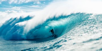 Photo by Kammeran Gonzalez-Keola: https://www.pexels.com/photo/man-riding-surfboard-in-wavy-ocean-7925859/