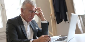 Photo by Andrea Piacquadio: https://www.pexels.com/photo/man-in-black-suit-jacket-while-using-laptop-3789100/