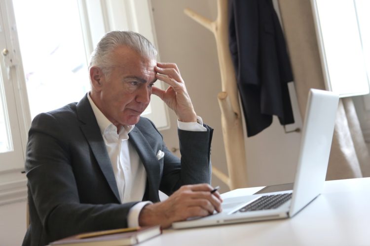 Photo by Andrea Piacquadio: https://www.pexels.com/photo/man-in-black-suit-jacket-while-using-laptop-3789100/