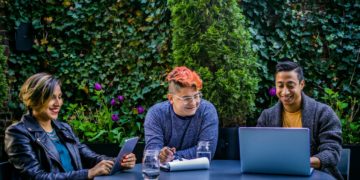 Photo by Jopwell: https://www.pexels.com/photo/two-men-and-woman-sitting-in-front-of-blue-table-2422282/