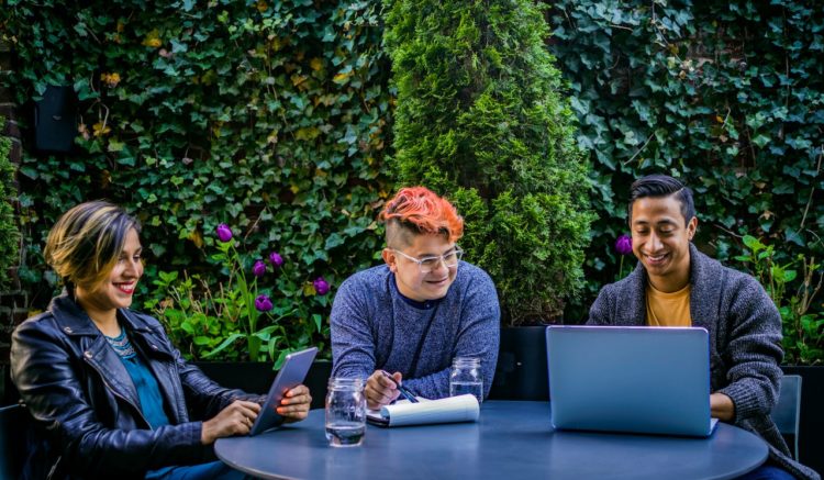 Photo by Jopwell: https://www.pexels.com/photo/two-men-and-woman-sitting-in-front-of-blue-table-2422282/