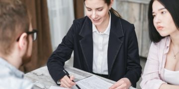Photo by Mikhail Nilov: https://www.pexels.com/photo/a-woman-explaining-to-her-client-7734579/