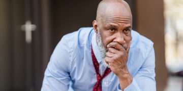 Photo by Nicola Barts : https://www.pexels.com/photo/concerned-black-businessman-in-city-7925815/