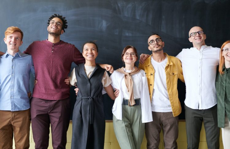Photo by fauxels from Pexels: https://www.pexels.com/photo/people-taking-group-picture-3184398/