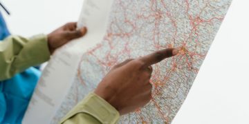 Photo by Tima Miroshnichenko: https://www.pexels.com/photo/a-person-holding-a-map-7009860/