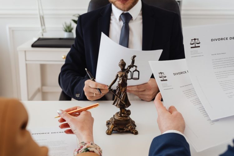 Photo by Karolina Grabowska: https://www.pexels.com/photo/lawyers-looking-at-divorce-paper-7876050/