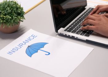Photo by Kindel Media: https://www.pexels.com/photo/a-paper-beside-a-person-typing-on-a-laptop-7688374/