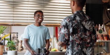 Photo by Thirdman: https://www.pexels.com/photo/a-man-standing-in-front-of-the-bar-counter-8936945/