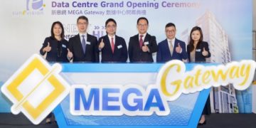 SUNeVision executives markeda new company milestone. (L-R) Elisha Tong, general manager, commercial; Robert Chan, non-executive director (and executive director of Sun Hung Kai Properties); Allen Fung, vice chairman and executive director (and executive director and CEO of non-property portfolio businesses of Sun Hung Kai Properties); Raymond Tong, CEO and executive director; Martin Chan, executive director and COO; and Helen Lo, general manager, commercial.
Meta description: Hong Kong-based data centre operator SUNeVision recently opened its new hyperscale data centre MEGA Gateway in Tsuen Wan, the seventh data centre on its portfolio.