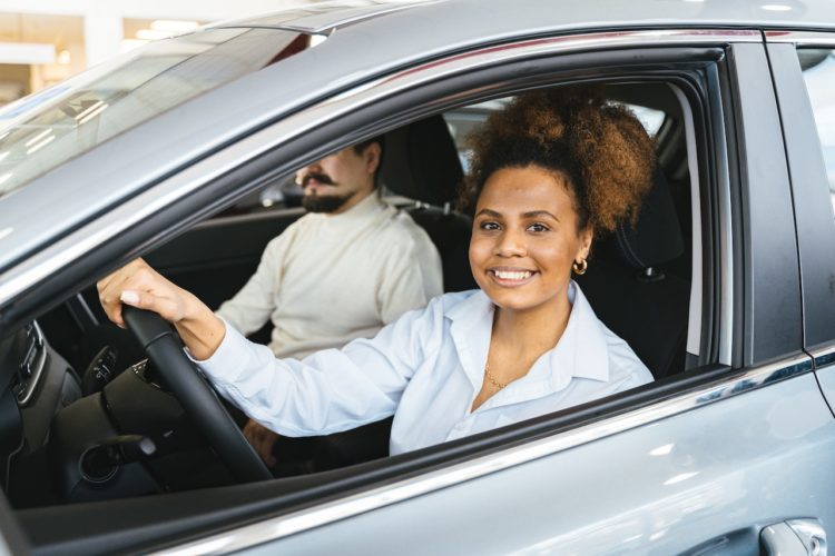 Photo by Antoni Shkraba: https://www.pexels.com/photo/smiling-woman-sitting-inside-the-car-7144214/