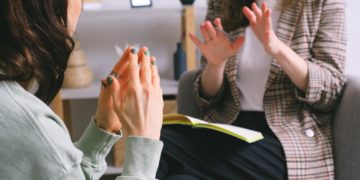 Photo by SHVETS production: https://www.pexels.com/photo/crop-unrecognizable-female-psychologist-and-patient-discussing-mental-problems-during-session-7176319/