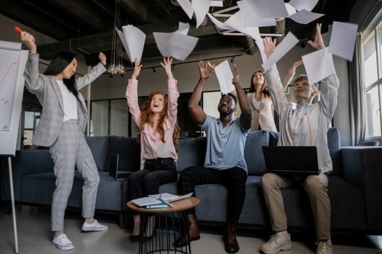 Photo by Alena Darmel: https://www.pexels.com/photo/photo-of-coworkers-throwing-pieces-of-paper-7710118/