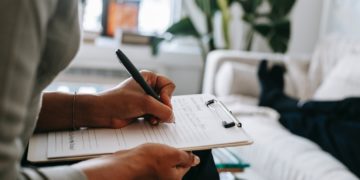 Photo by Alex Green: https://www.pexels.com/photo/crop-ethnic-psychologist-writing-on-clipboard-during-session-5699456/