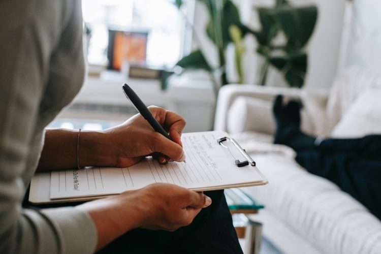 Photo by Alex Green: https://www.pexels.com/photo/crop-ethnic-psychologist-writing-on-clipboard-during-session-5699456/