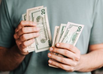 Photo by Karolina Grabowska: https://www.pexels.com/photo/crop-man-counting-dollar-banknotes-4386431/