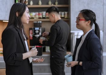 Photo by Mikhail Nilov: https://www.pexels.com/photo/woman-in-black-blazer-holding-white-ceramic-mug-8102169/