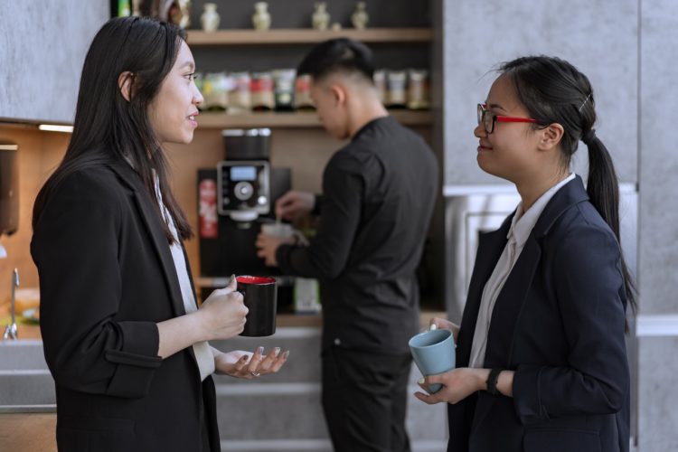 Photo by Mikhail Nilov: https://www.pexels.com/photo/woman-in-black-blazer-holding-white-ceramic-mug-8102169/