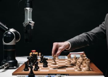 Photo by Pavel Danilyuk: https://www.pexels.com/photo/a-person-playing-chess-8438944/