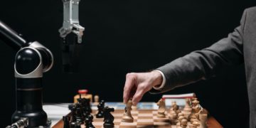 Photo by Pavel Danilyuk: https://www.pexels.com/photo/a-person-playing-chess-8438944/