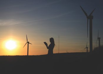 Photo by Richard Dacker: https://www.pexels.com/photo/silhouette-of-woman-holding-book-near-windmills-636335/