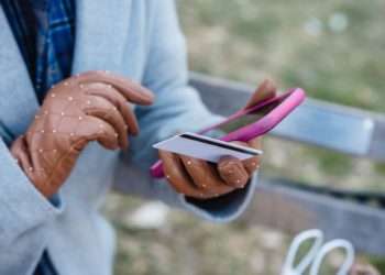 Photo by Tim Douglas : https://www.pexels.com/photo/crop-unrecognizable-woman-with-online-payment-via-smartphone-in-park-6567546/