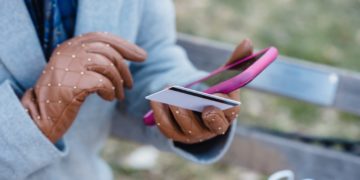 Photo by Tim Douglas : https://www.pexels.com/photo/crop-unrecognizable-woman-with-online-payment-via-smartphone-in-park-6567546/