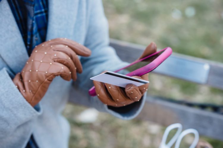 Photo by Tim Douglas : https://www.pexels.com/photo/crop-unrecognizable-woman-with-online-payment-via-smartphone-in-park-6567546/