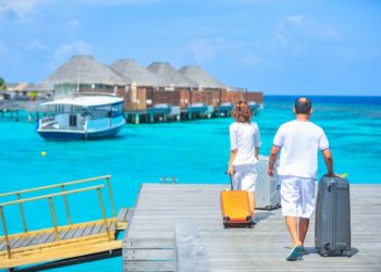 Photo by Asad Photo Maldives: https://www.pexels.com/photo/man-and-woman-walks-on-dock-1268855/