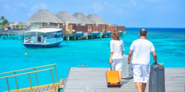 Photo by Asad Photo Maldives: https://www.pexels.com/photo/man-and-woman-walks-on-dock-1268855/