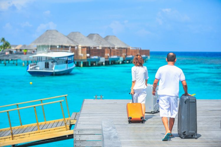 Photo by Asad Photo Maldives: https://www.pexels.com/photo/man-and-woman-walks-on-dock-1268855/