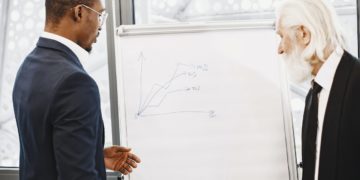 Photo by Gustavo Fring: https://www.pexels.com/photo/businessman-discussing-a-chart-at-a-business-meeting-6285130/