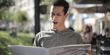 Photo by Andrea Piacquadio: https://www.pexels.com/photo/shallow-focus-photo-of-man-reading-newspaper-3799099/