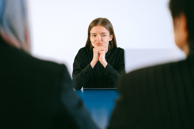 Photo by Anna Shvets: https://www.pexels.com/photo/woman-in-black-blazer-sitting-being-interview-4226118/